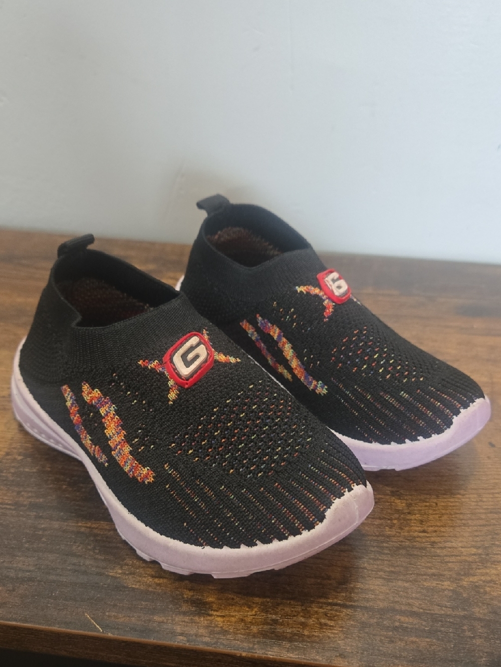 Kids Black Slip-On Knit Sneakers with Lavender Sole - Logo